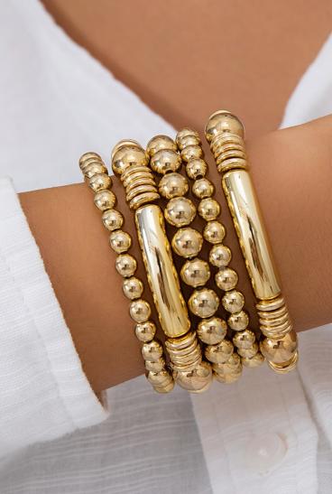 Elegante set di quattro bracciali, colore oro