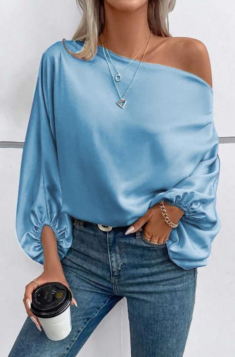 Blusa elegante con scollo asimmetrico, di colore azzurro